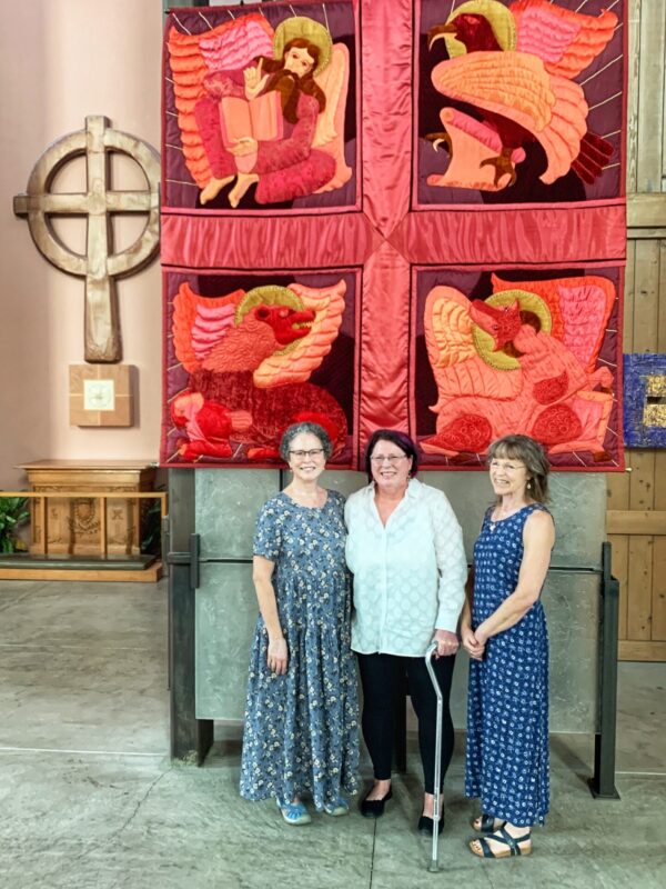 The daughters of artist Margaret Hays visited the banner, July 2021.